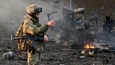 Ukrainian service member seen at the site of fighting with a Russian raiding group